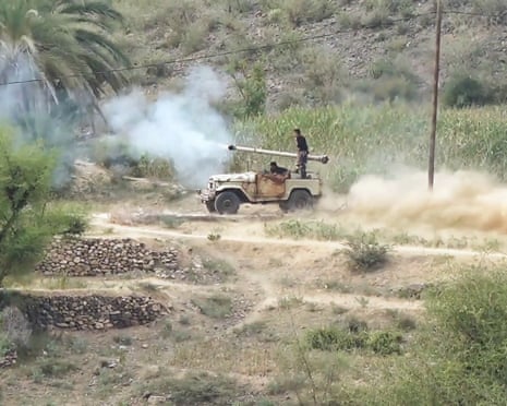 A weapon is fired from a jeep in a rural part of Yemen
