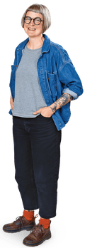 A woman with a bob and round black glasses wearing a demim jacket over a grey T-shirt.