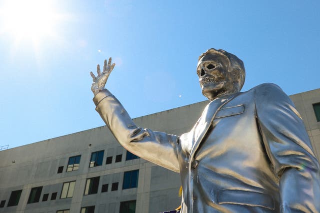 A melting statue of Ron DeSantis has been unveiled by protestors taking at his climate policies
