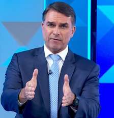 Flávio Bolsonaro durante o debate da Globo Foto: Reprodução/Globo